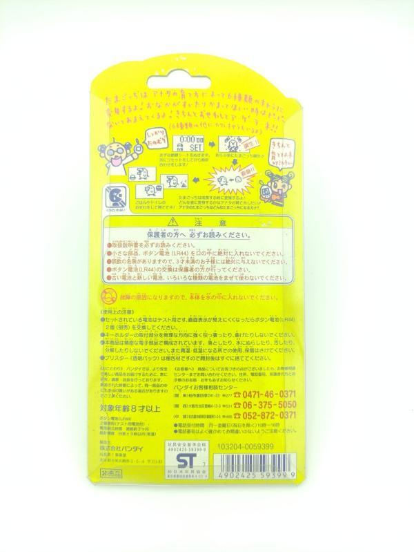 Tamagotchi Original P2 JAL Black w/ orange Bandai 1997 Buy-Tamagotchis 3
