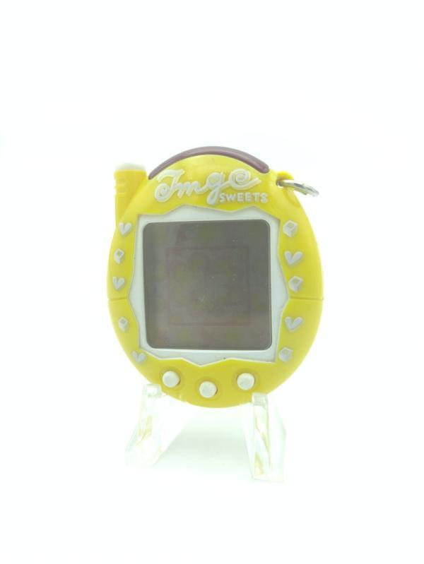 Tamagotchi Keitai Kaitsuu! Tamagotchi Plus Akai Caramel Bandai Yellow Buy-Tamagotchis 2