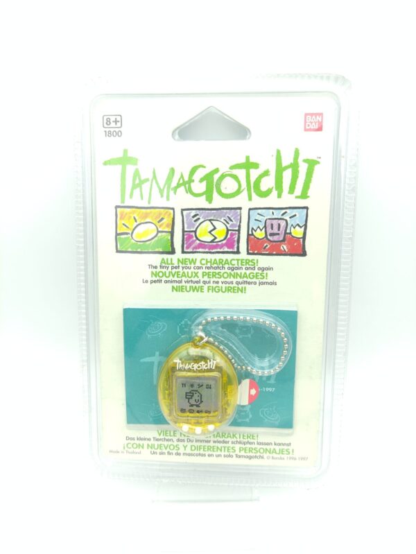 Tamagotchi Original P1/P2 Clear yellow Bandai 1997 English Boutique-Tamagotchis