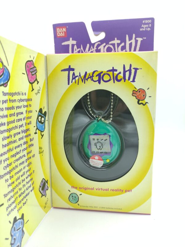Tamagotchi Original P1/P2 green w/ blue Bandai 1997 English Boutique-Tamagotchis
