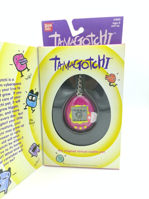 Tamagotchi Original P1/P2 purple w/ yellow Bandai 1997 English Boutique-Tamagotchis