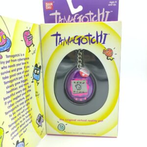 Tamagotchi Original P1/P2 purple w/ yellow Bandai 1997 English Boutique-Tamagotchis 4