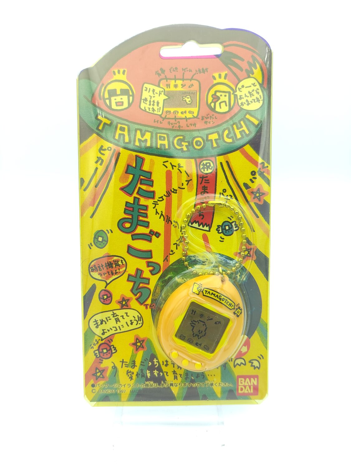 Tamagotchi Original P1/P2 yellow w/ orange Bandai 1997 English