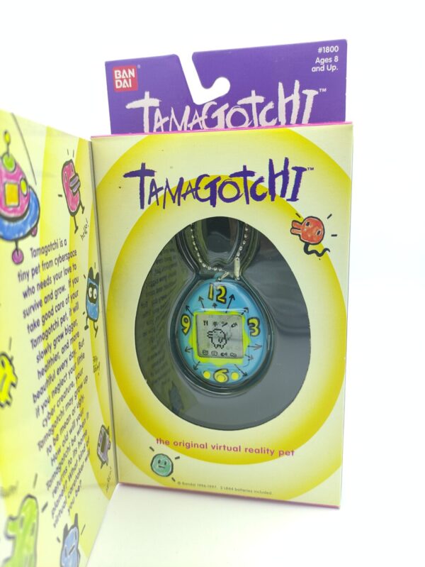 Tamagotchi Original P1/P2 Teal w/ yellow Bandai Japan 1997 English Boutique-Tamagotchis