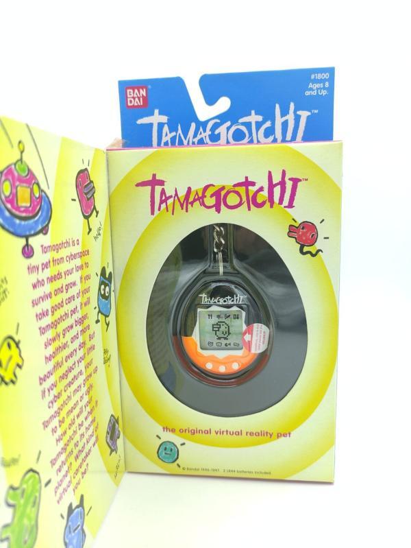 Tamagotchi Original P1/P2 orange w/ black Bandai 1997 English Buy-Tamagotchis 2
