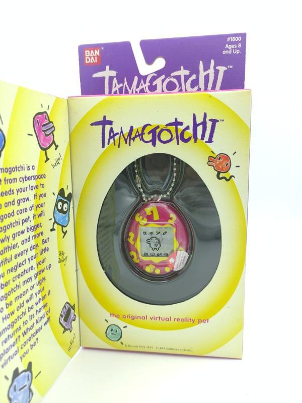 Tamagotchi Original P1/P2 purple w/ yellow Bandai 1997 English Buy-Tamagotchis 2