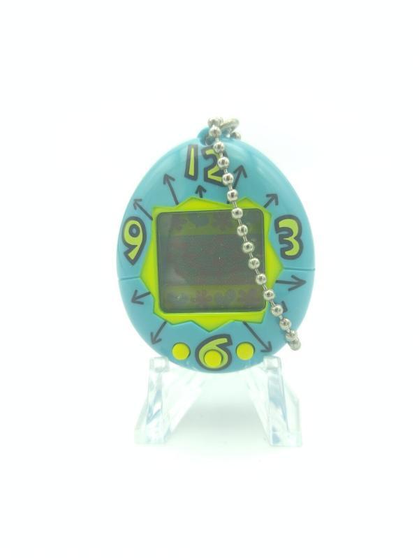 Tamagotchi Original P1/P2 Teal w/ yellow Bandai Japan 1997 Buy-Tamagotchis 2