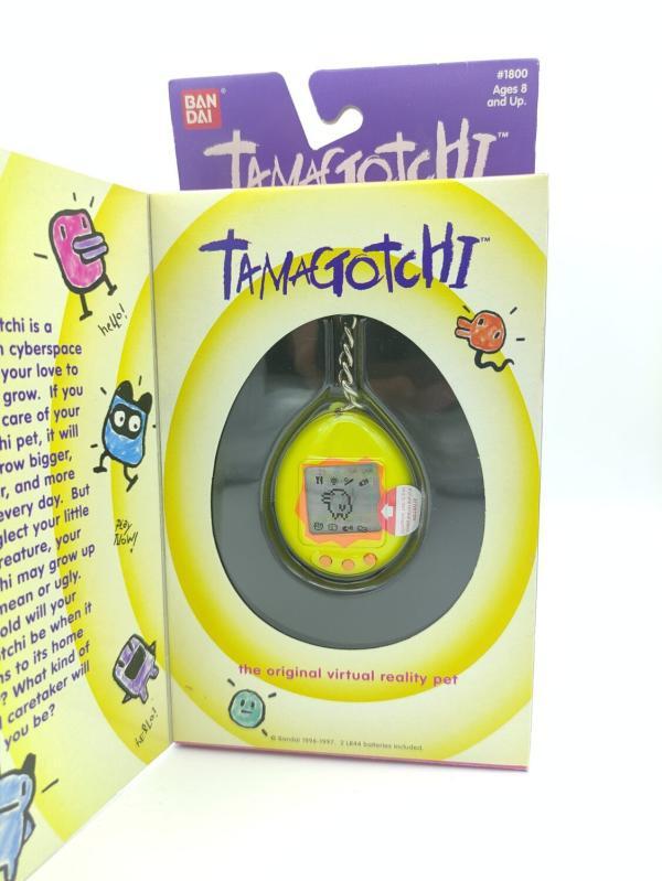 Tamagotchi Original P1/P2 yellow w/ orange Bandai 1997 English Buy-Tamagotchis 2