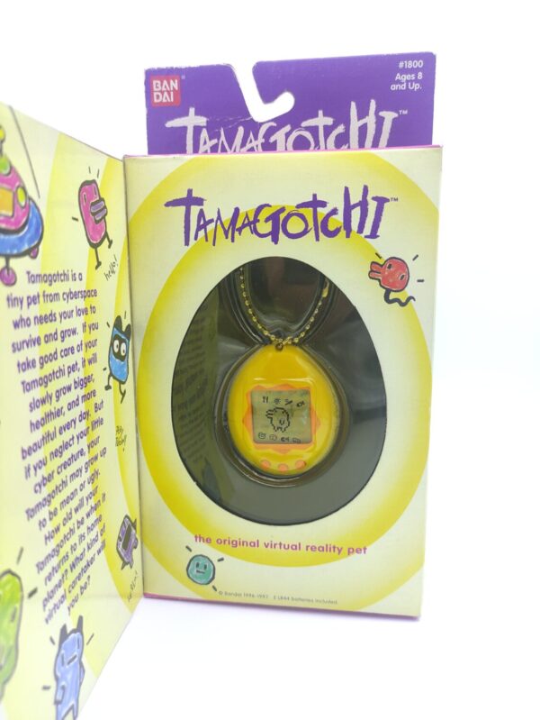 Tamagotchi Original P1/P2 Yellow w/orange Bandai 1997 Boutique-Tamagotchis