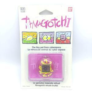 Tamagotchi Original P1/P2 Purple w/ yellow Bandai 1997 English Boutique-Tamagotchis