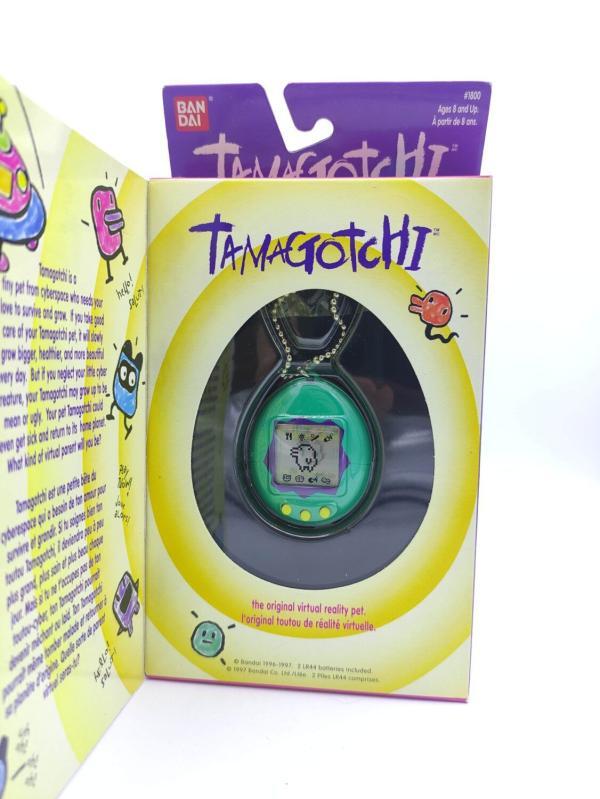 Tamagotchi Original P1/P2 green w/ blue Bandai 1997 English Boutique-Tamagotchis