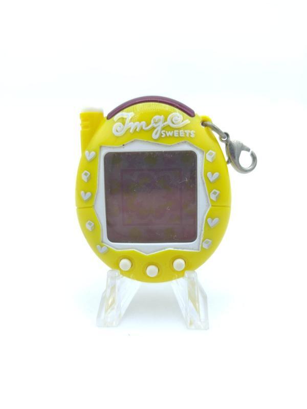 Tamagotchi Keitai Kaitsuu! Tamagotchi Plus Akai Caramel Bandai Yellow Buy-Tamagotchis 2