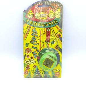 Tamagotchi Original P1/P2 Mint w/ yellow Bandai Japan 1997 Buy-Tamagotchis