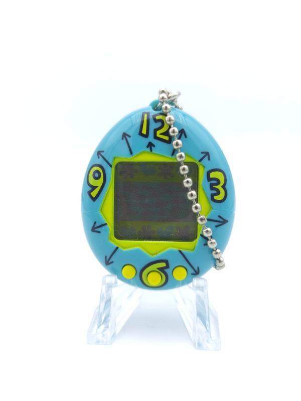 Tamagotchi Original P1/P2 Teal w/ yellow Bandai Japan 1997 Buy-Tamagotchis 2