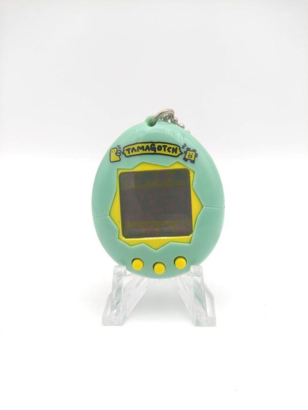 Tamagotchi Original P1/P2 Mint w/ yellow Bandai Japan 1997 Buy-Tamagotchis 2