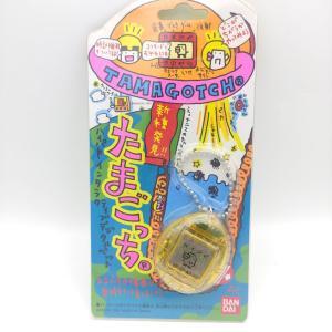 Tamagotchi Original P1/P2 clear yellow Bandai 1997 Buy-Tamagotchis