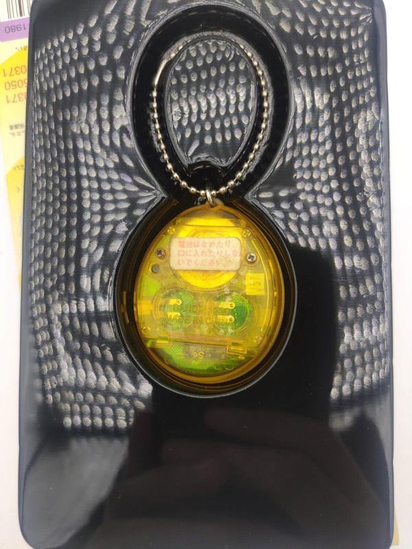 Tamagotchi Original P1/P2 clear yellow Bandai 1997 Buy-Tamagotchis 4