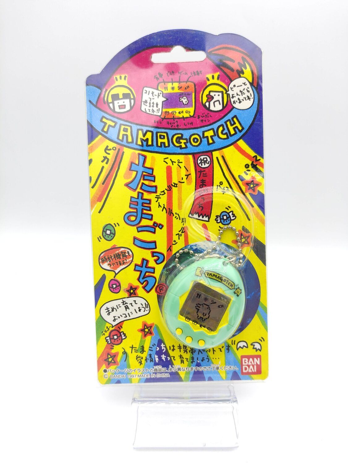 Tamagotchi Original P1/P2 Mint w/ yellow Bandai Japan 1997