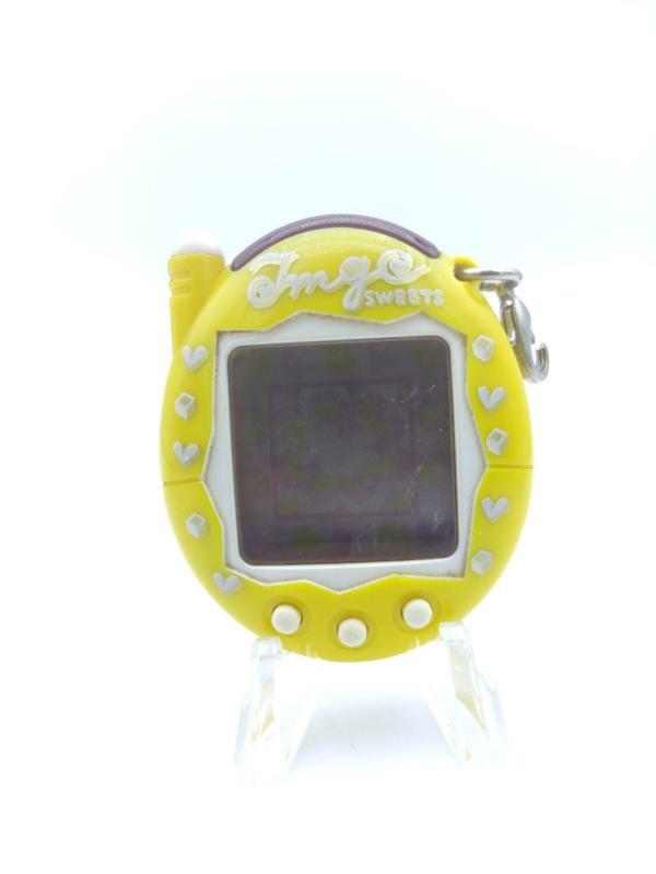 Tamagotchi Keitai Kaitsuu! Tamagotchi Plus Akai Caramel Bandai Yellow Buy-Tamagotchis 2
