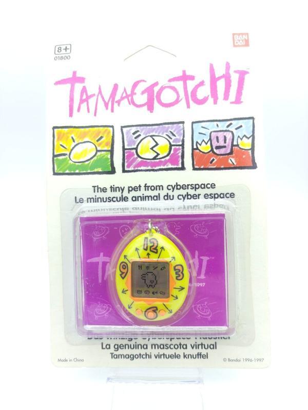 Tamagotchi Original P1/P2 yellow w/ orange Bandai 1997 English Buy-Tamagotchis 2