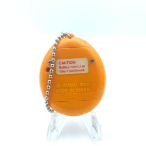 Tamagotchi Original P1/P2 orange w/ yellow Bandai 1997 English Buy-Tamagotchis 2