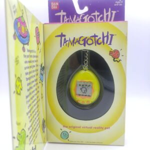 Tamagotchi Original P1/P2 yellow w/ orange Bandai 1997 English Buy-Tamagotchis