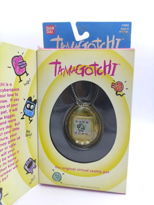Tamagotchi Original P1/P2 clear yellow Bandai 1997 english Buy-Tamagotchis 2