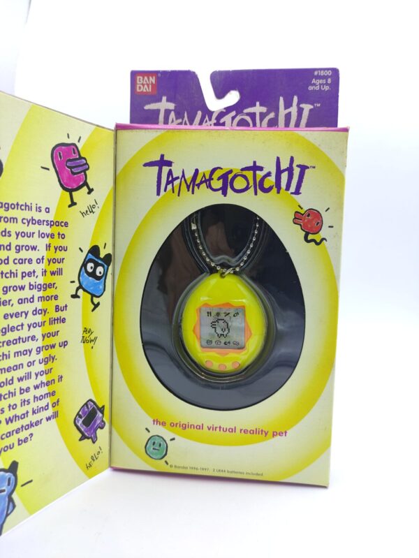 Tamagotchi Original P1/P2 Yellow w/orange Bandai 1997 Boutique-Tamagotchis