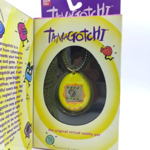 Tamagotchi Original P1/P2 Teal w/ yellow Bandai Japan 1997 Boutique-Tamagotchis 4