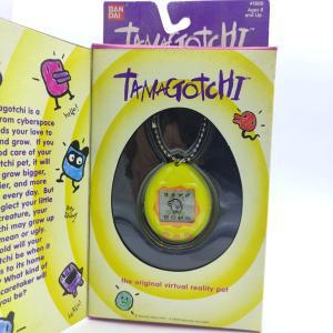 Tamagotchi Original P1/P2 Yellow w/orange Bandai 1997 Buy-Tamagotchis