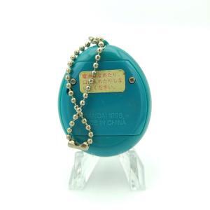 Tamagotchi Original P1/P2 Teal w/ yellow Bandai Japan 1997 Buy-Tamagotchis 2