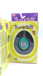 Tamagotchi Original P1/P2 green w/ blue Bandai 1997 English Boutique-Tamagotchis 2