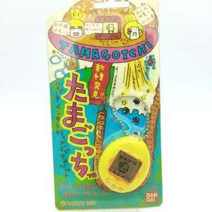 Tamagotchi Original P1/P2 yellow w/ orange Bandai 1997 English Buy-Tamagotchis