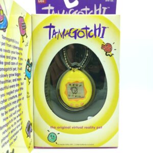Tamagotchi Original P1/P2 Yellow w/ orange Bandai 1997 Buy-Tamagotchis