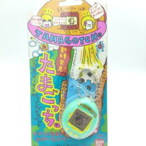Tamagotchi Original P1/P2 Teal w/ yellow Bandai Japan 1997 Buy-Tamagotchis