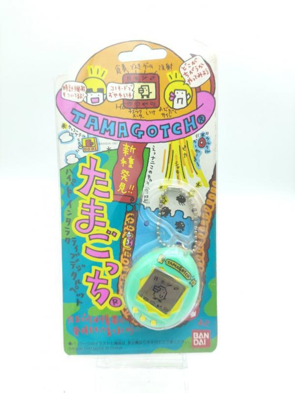 Tamagotchi Original P1/P2 Teal w/ yellow Bandai Japan 1997 Buy-Tamagotchis 2