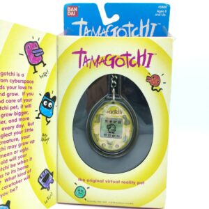 Tamagotchi Original P1/P2 green camo Bandai 1997 English Buy-Tamagotchis