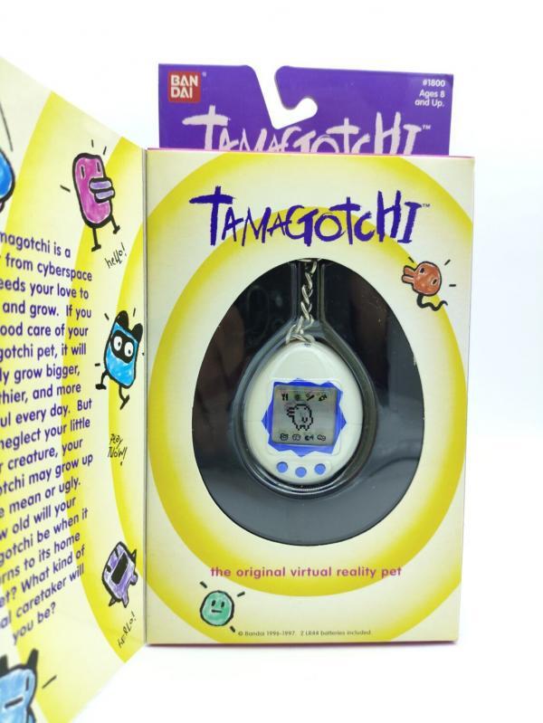 Tamagotchi Original P1/P2 white w/ blue Bandai 1997 English Buy-Tamagotchis 2