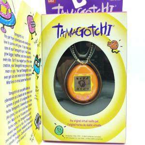 Tamagotchi Original P1/P2 orange w/ yellow Bandai 1997 English Buy-Tamagotchis