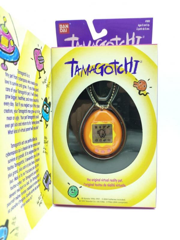 Tamagotchi Original P1/P2 orange w/ yellow Bandai 1997 English Buy-Tamagotchis 2