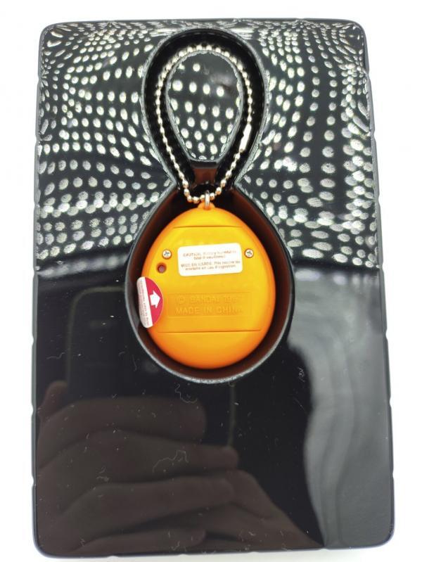 Tamagotchi Original P1/P2 orange w/ yellow Bandai 1997 English Buy-Tamagotchis 4