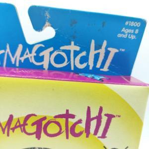 Tamagotchi Original P1/P2 green camo Bandai 1997 English Buy-Tamagotchis 2