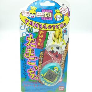 Tamagotchi Original P1/P2 Teal w/ yellow Bandai Japan 1997 Buy-Tamagotchis
