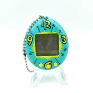 Tamagotchi Original P1/P2 Teal w/ yellow Bandai Japan 1997 Buy-Tamagotchis 2